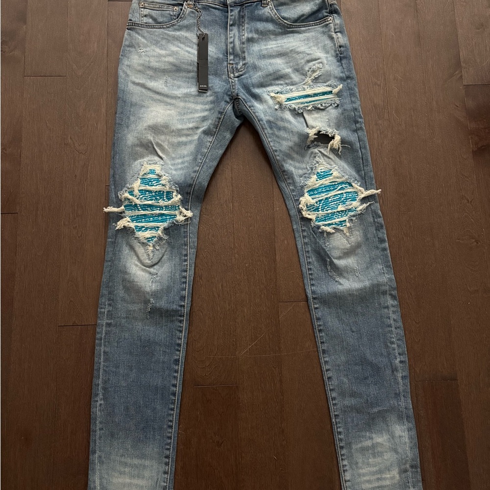 AMIRI Light Blue Distressed Skinny Jeans
